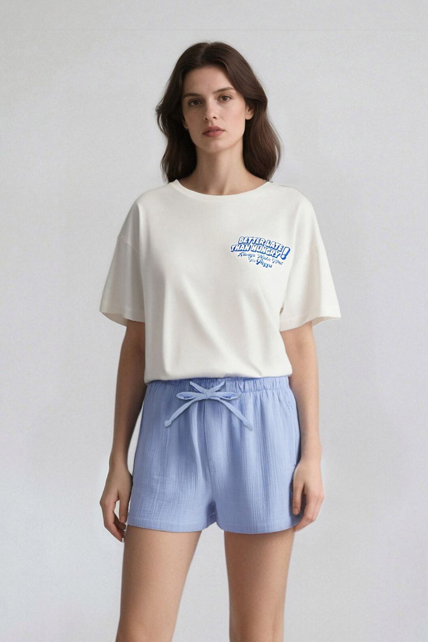 حريمي اوف وايت تيشيرت نص كم اوفر سايز بطبعة من الخلف