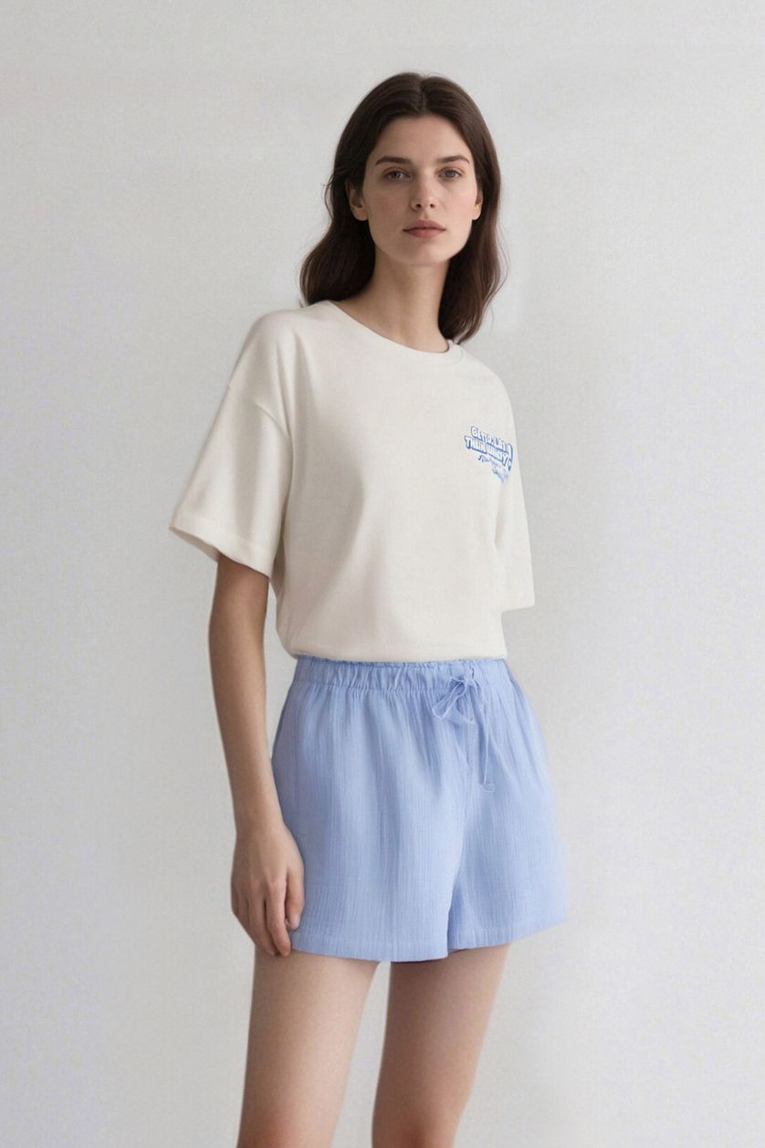 حريمي اوف وايت تيشيرت نص كم اوفر سايز بطبعة من الخلف