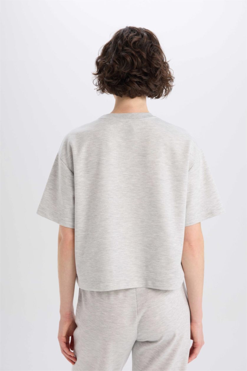 نساء رمادي فاتح تيشيرت نص كم  اوفر سايز قصة عادية برقبة مستديرة