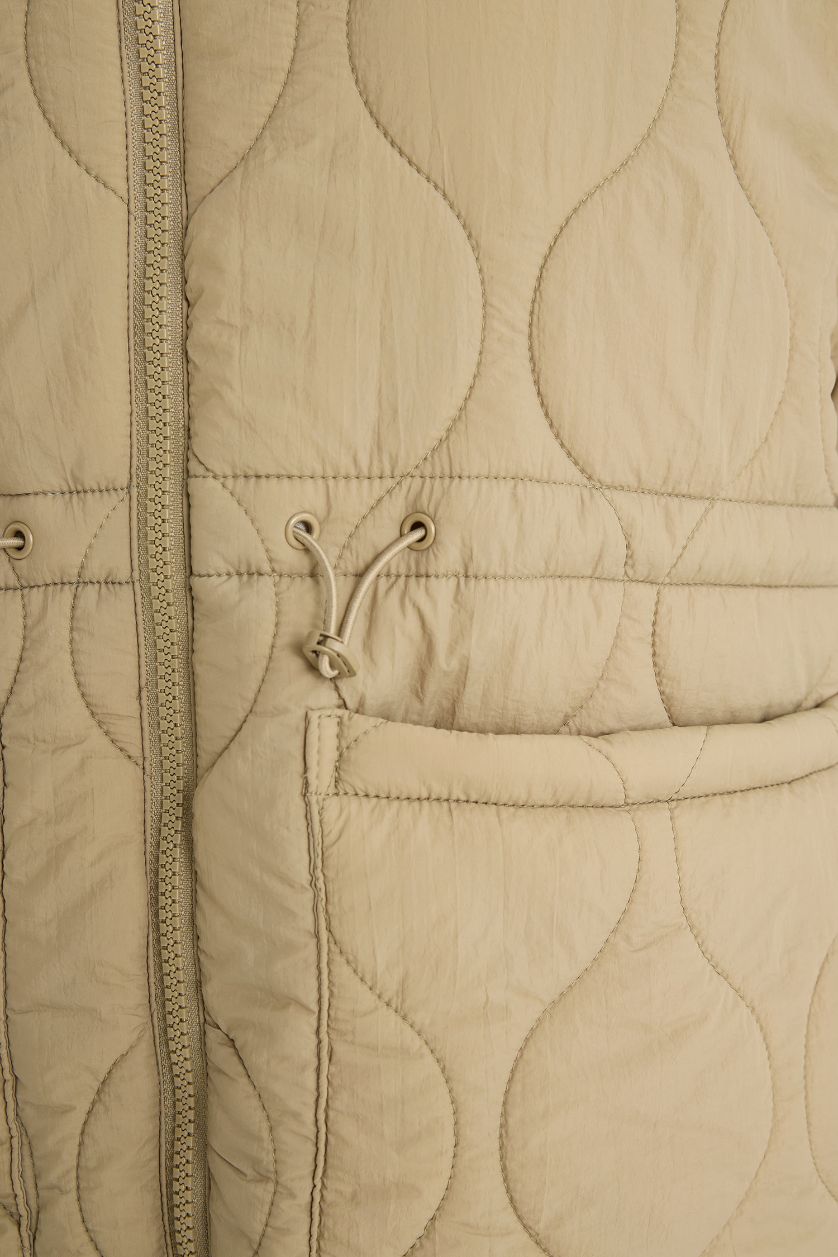 حريمي كاكي جاكيت وتر بروف مبطن قصة عادية بكابيشون