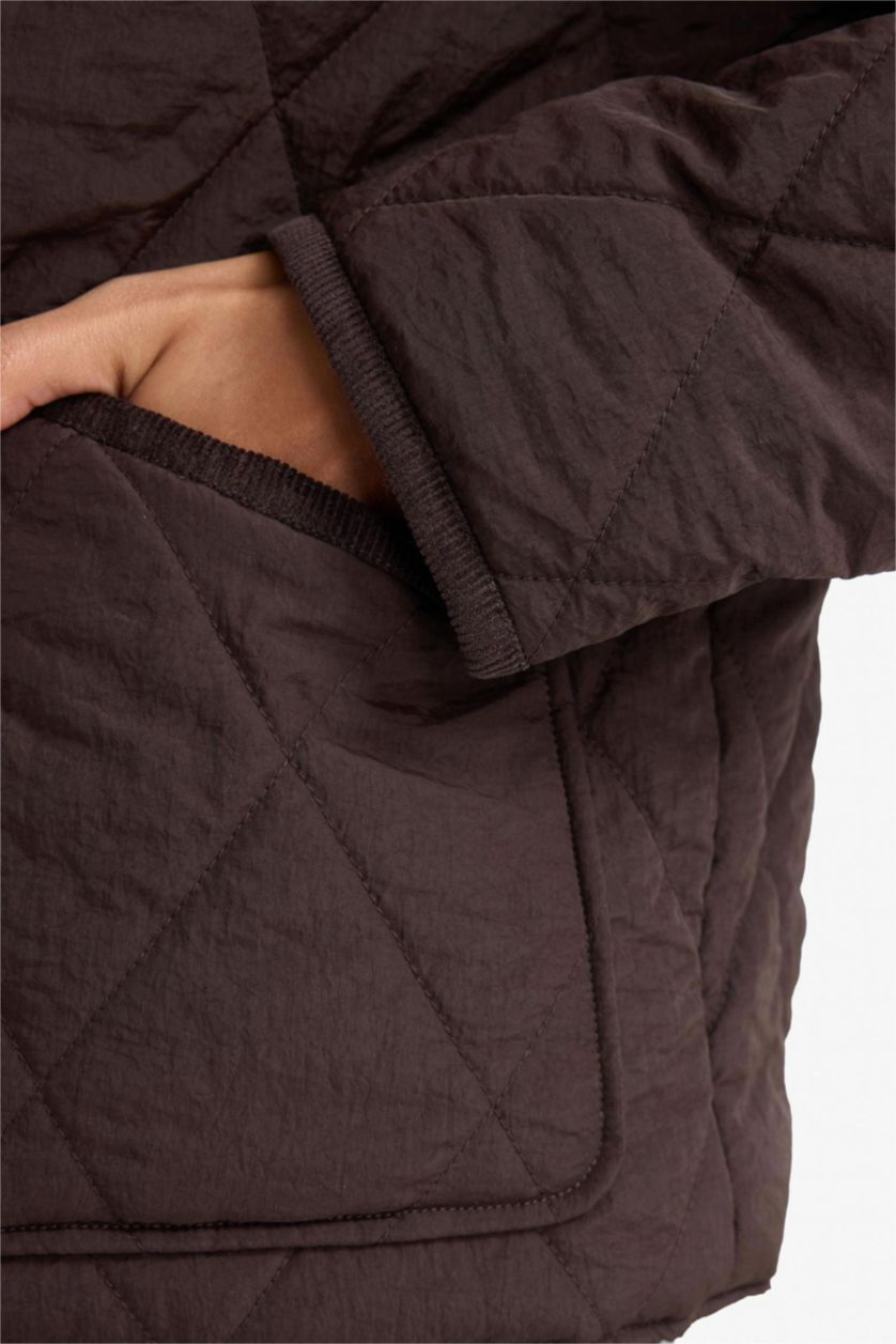 حريمي كامل جاكيت بامب قصة عادية وتر بروف وياقة بولو