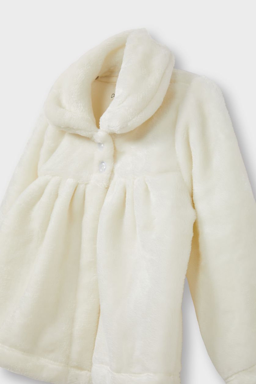 طفلة صغيرة بيج فاتح جاكيت قطيفة بيبي بناتي قصة عادية بأزرار