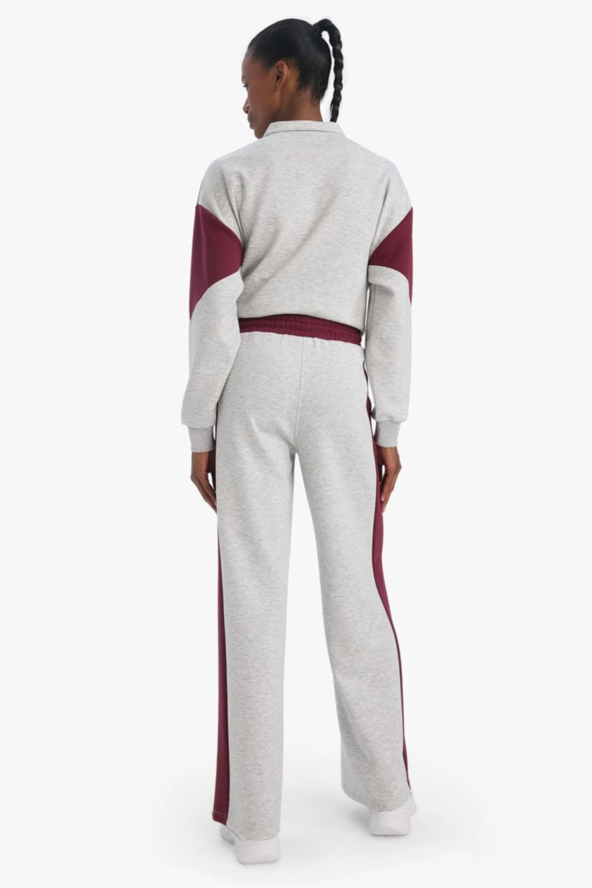 حريمي ميلانج رمادي فاتح بنطلون قماش سكوبا وايد ليج برجل واسع بجيب من DeFactoFit NBA Boston Celtics