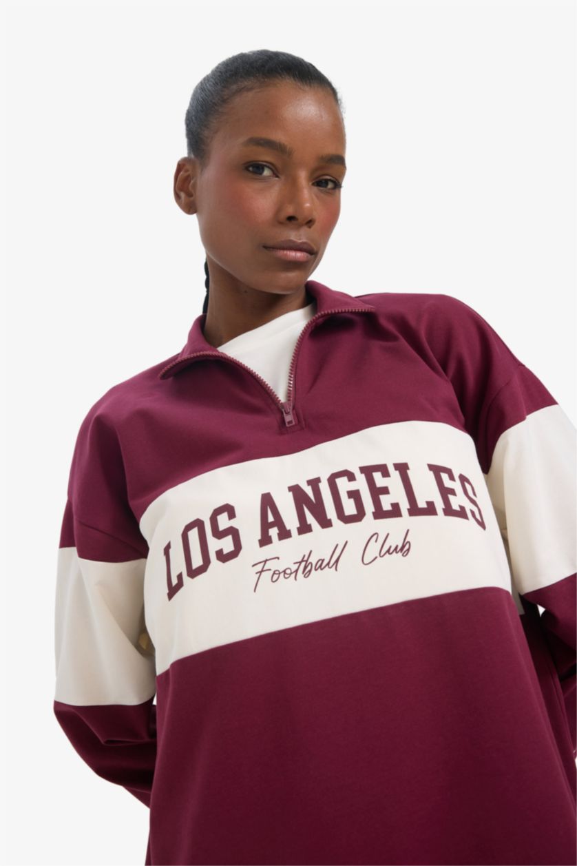 حريمي خمري سويت شيرت رياضي اوفر سايز بياقة نص سوسته من DeFactoFit