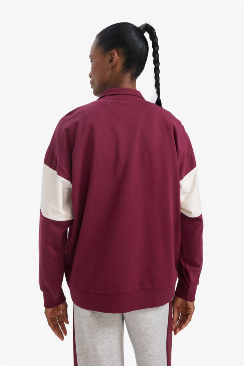 حريمي خمري سويت شيرت رياضي اوفر سايز بياقة نص سوسته من DeFactoFit