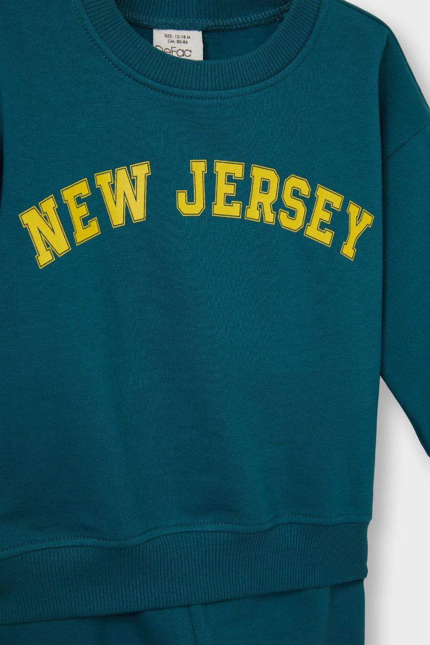 طفل صغير أخضر سيت بيبي أولادي سويت شيرت بطبعة شعار بياقة مستديرة وبنطرون رياضي- قطعتين