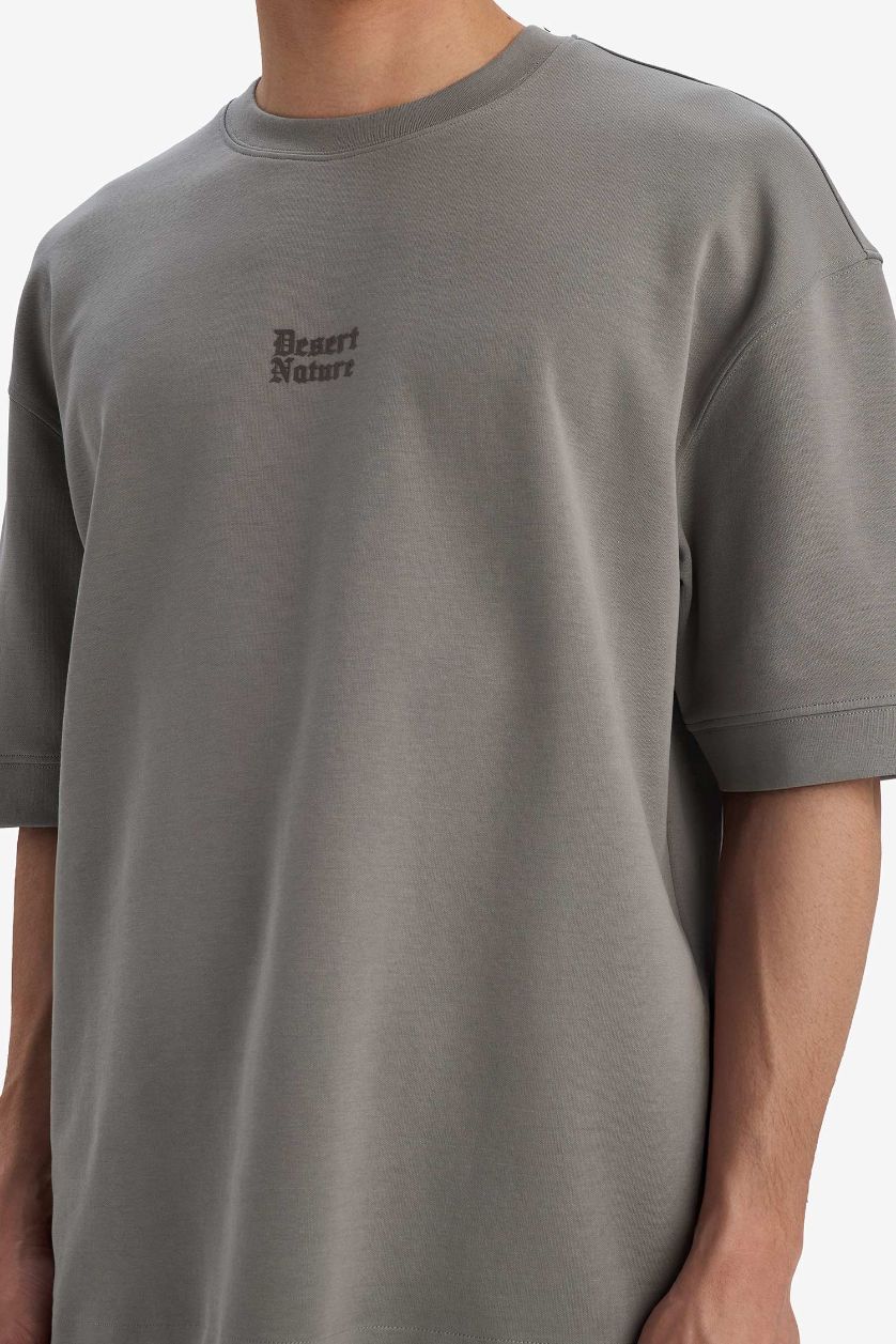 رجال رمادي تيشيرت نص ردن مطبوع قصة فضفاضة بياخة مستديرة