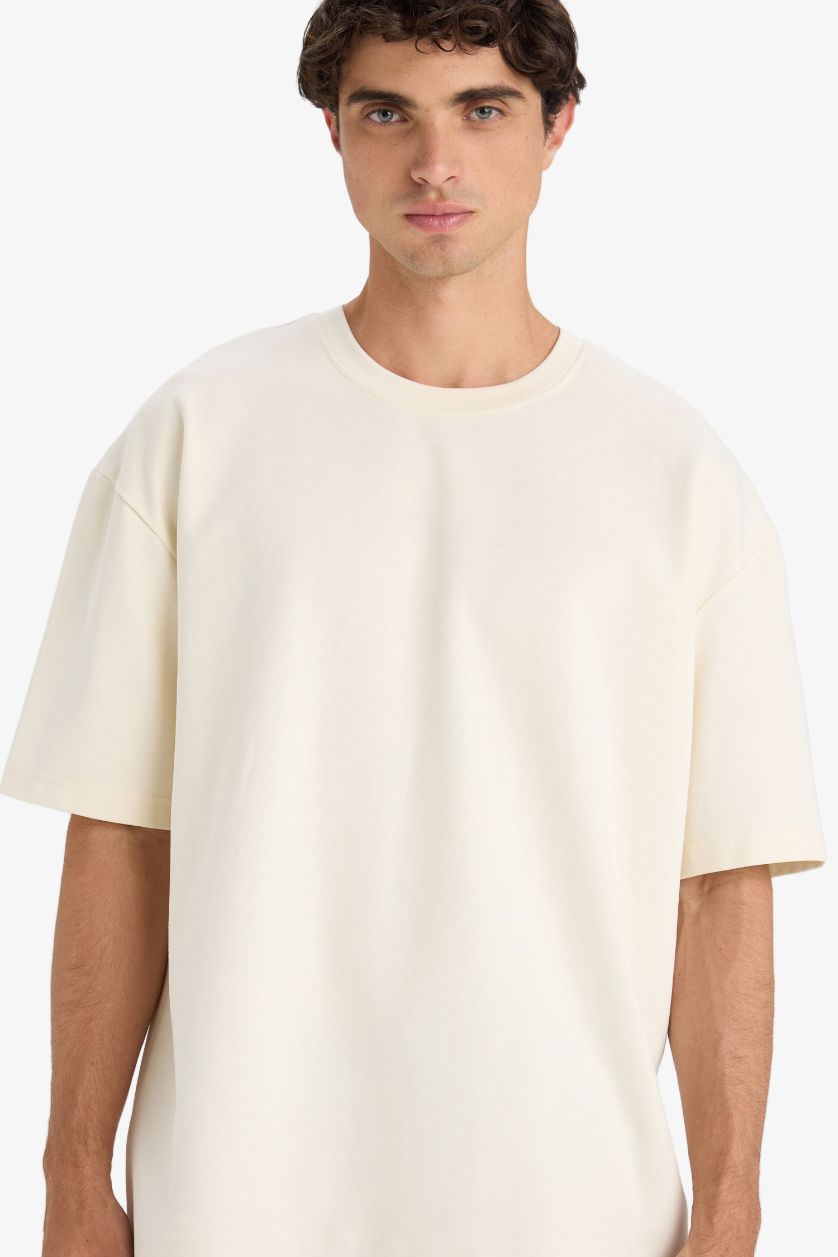 رجالي بيج فاتح تيشيرت نص كم اوفر سايز برقبة مستديرة