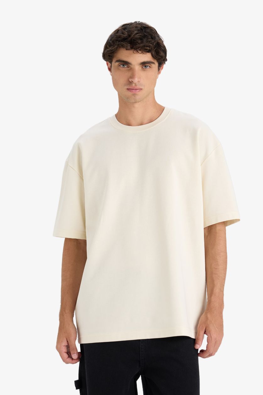 رجالي بيج فاتح تيشيرت نص كم اوفر سايز برقبة مستديرة