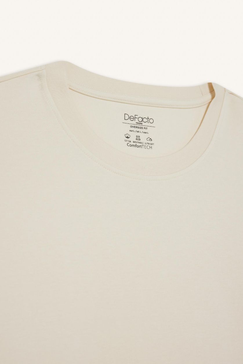 رجالي بيج فاتح تيشيرت نص كم اوفر سايز برقبة مستديرة