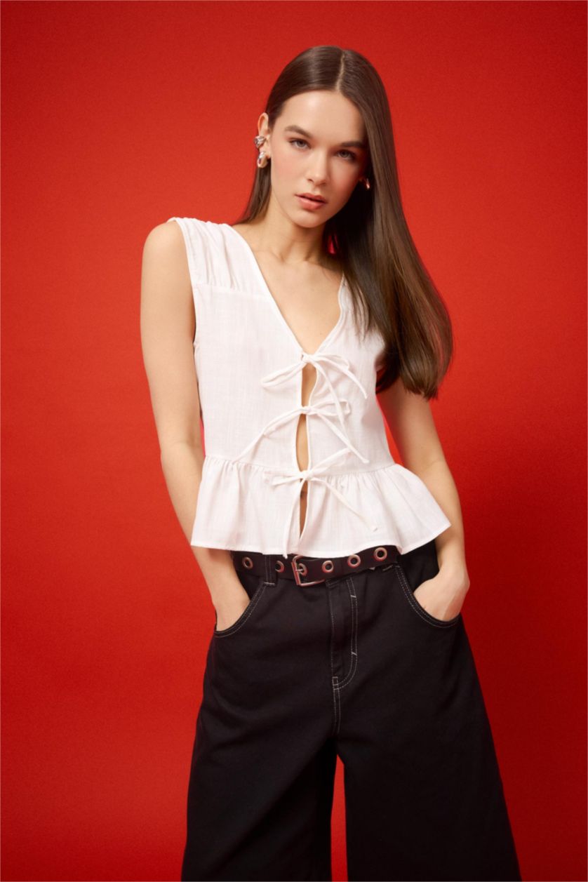 FEMME Blanc Blouse sans manches à col V avec nœud Coupe régulière