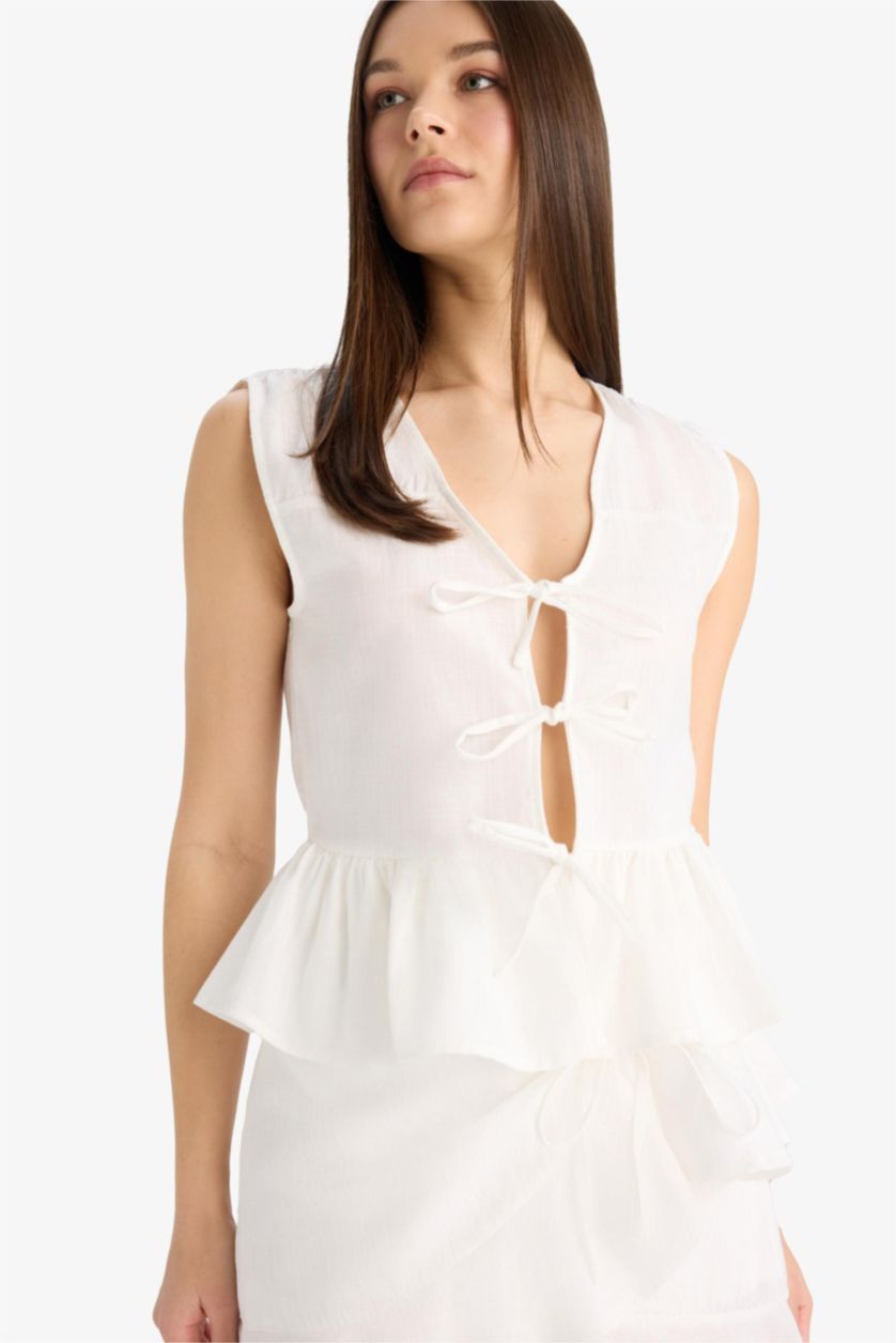 FEMME Blanc Blouse sans manches à col V avec nœud Coupe régulière