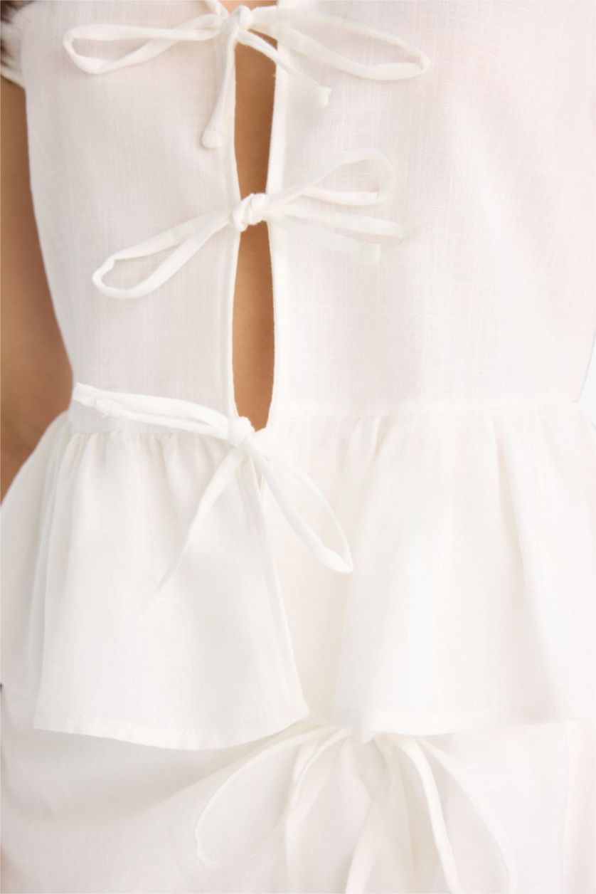 FEMME Blanc Blouse sans manches à col V avec nœud Coupe régulière