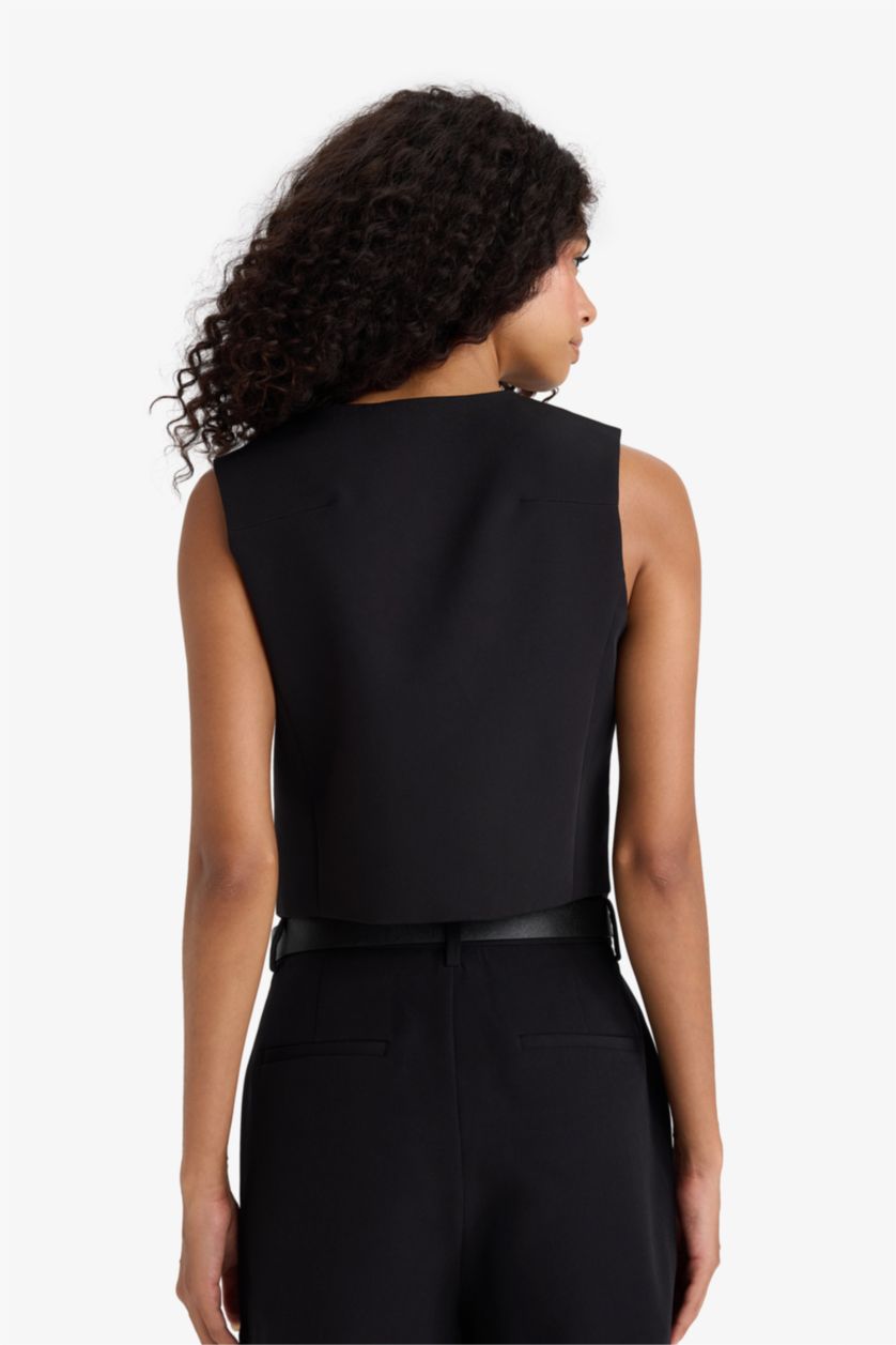 حريمي أسود فيست غير متماثل بياقة V