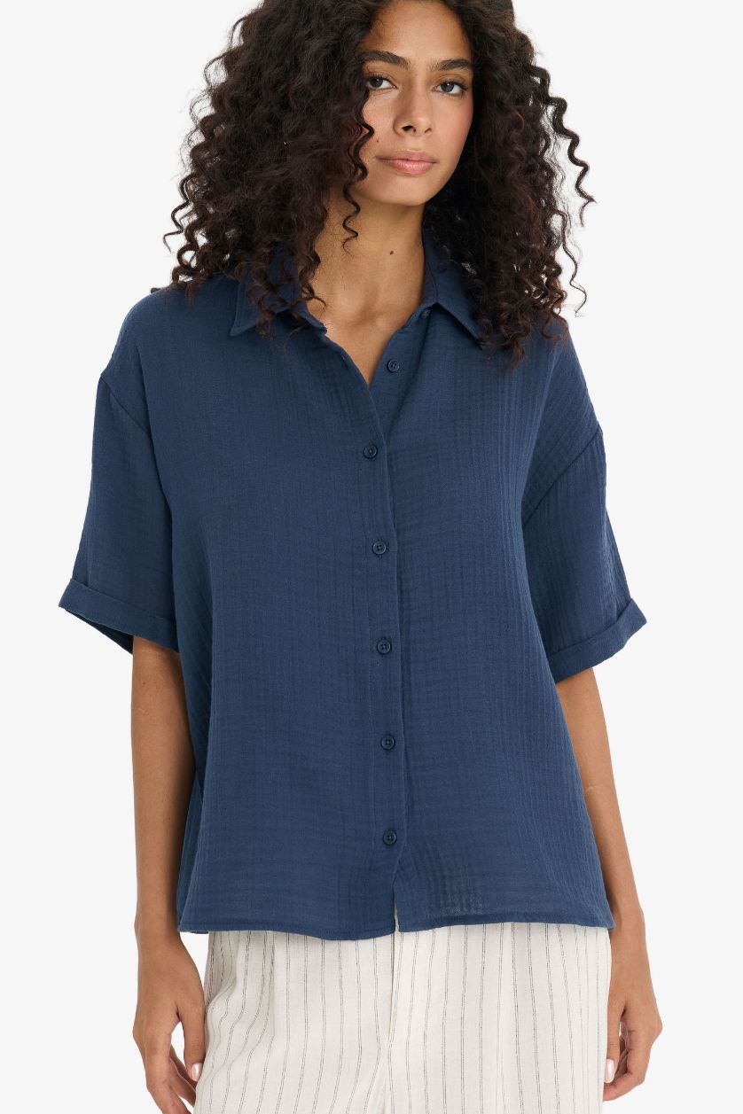 نساء كحلي فاتح قميص نص ردن موسلين قصة عادية