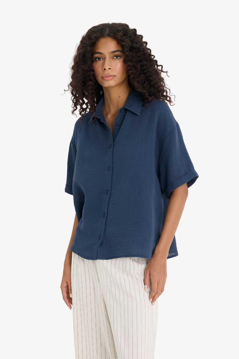 نساء كحلي فاتح قميص نص ردن موسلين قصة عادية