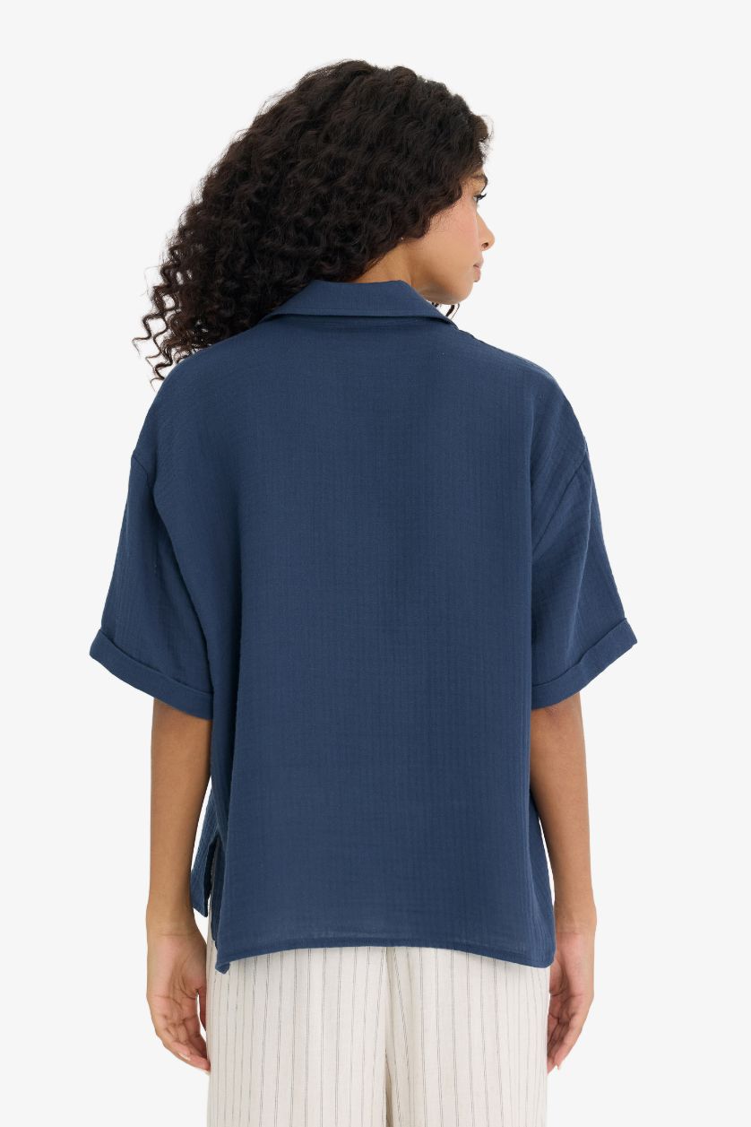 نساء كحلي فاتح قميص نص ردن موسلين قصة عادية