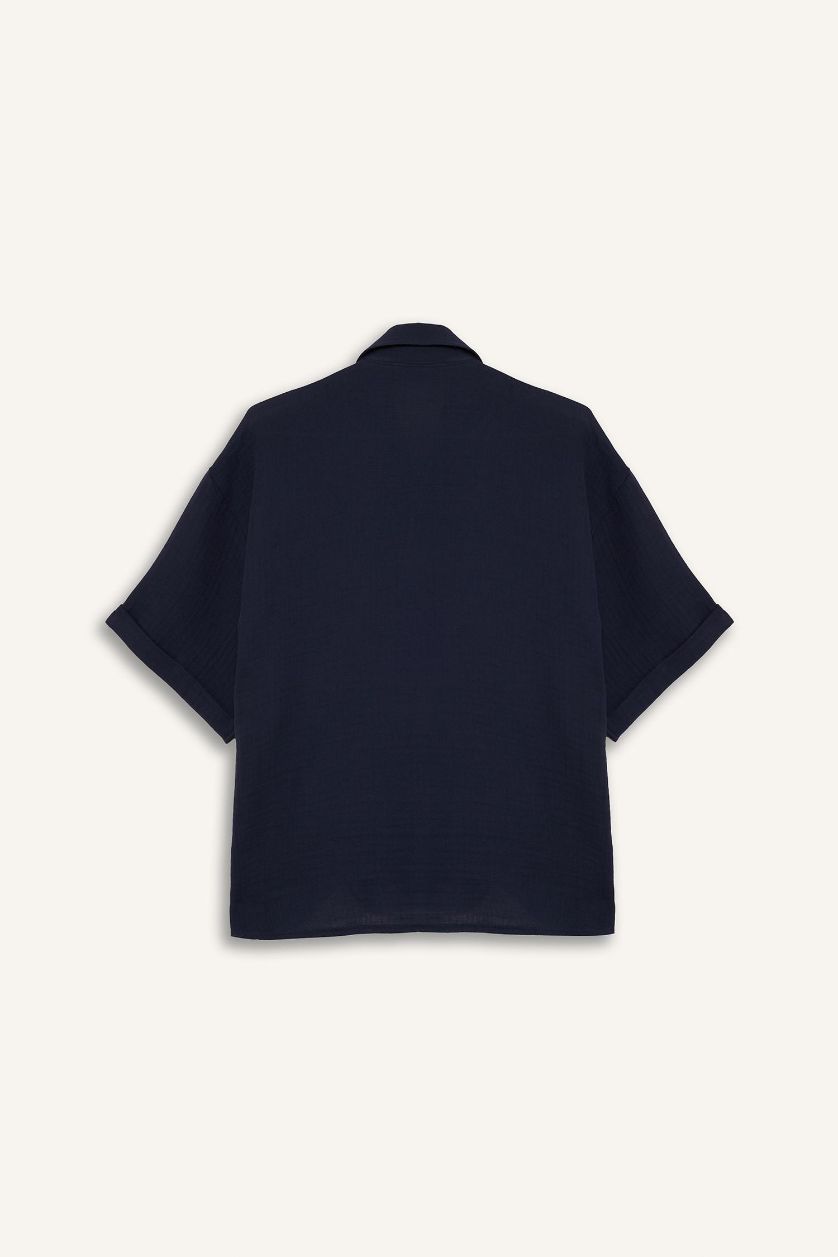 نساء كحلي فاتح قميص نص ردن موسلين قصة عادية