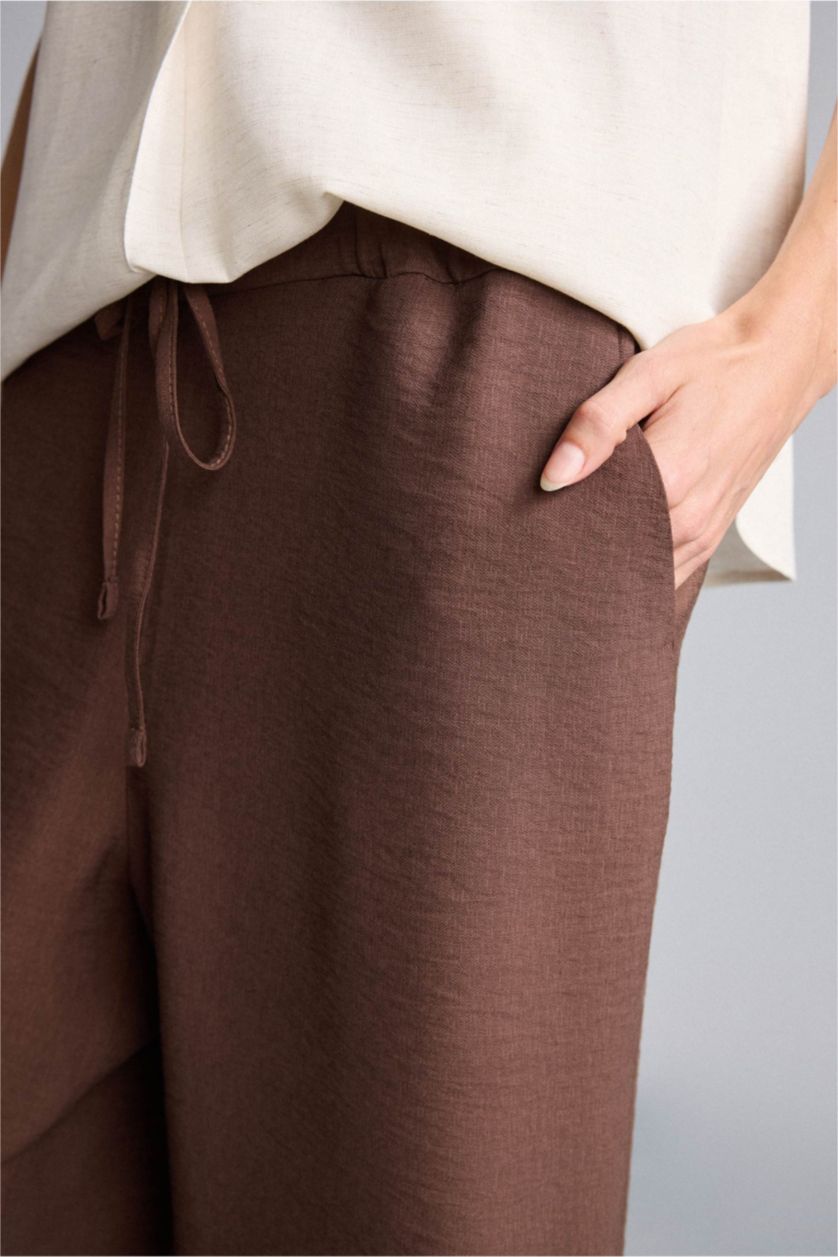 FEMME Marron Droit