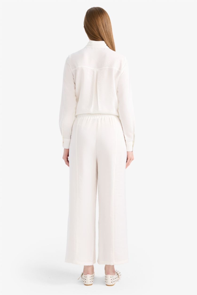 حريمي بيج فاتح بنطلون بيزك سادة برجل عادية