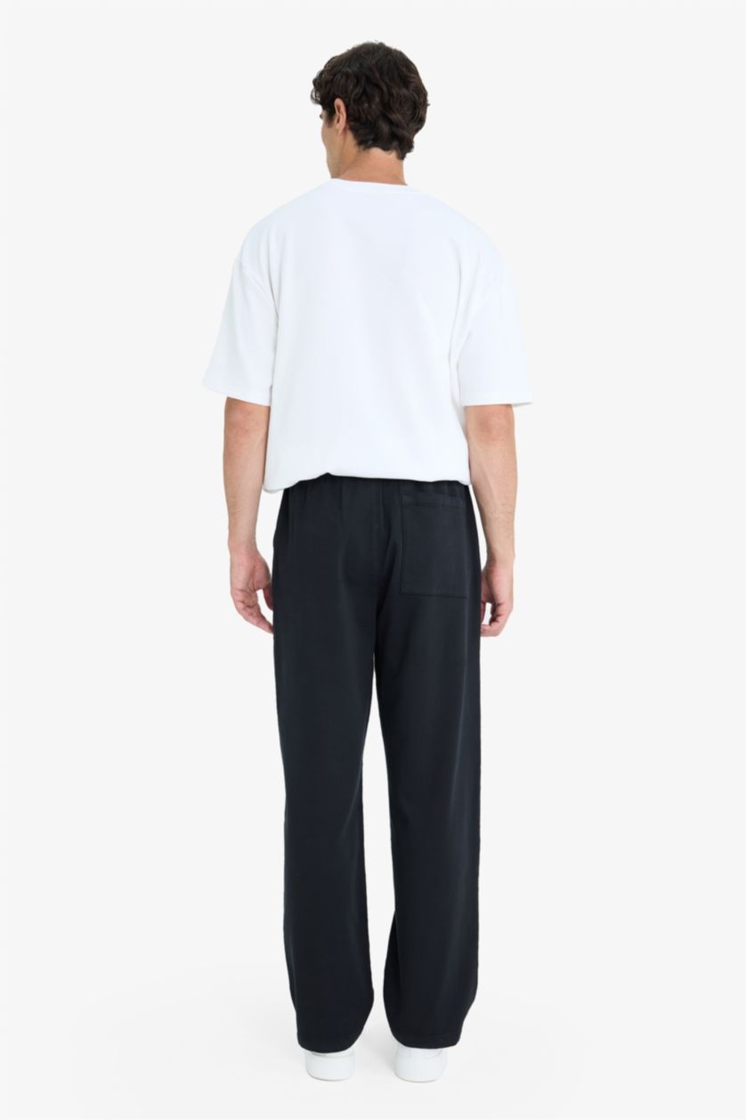 MAN Black Wide Leg Regular Hem Zip-Up Trousers