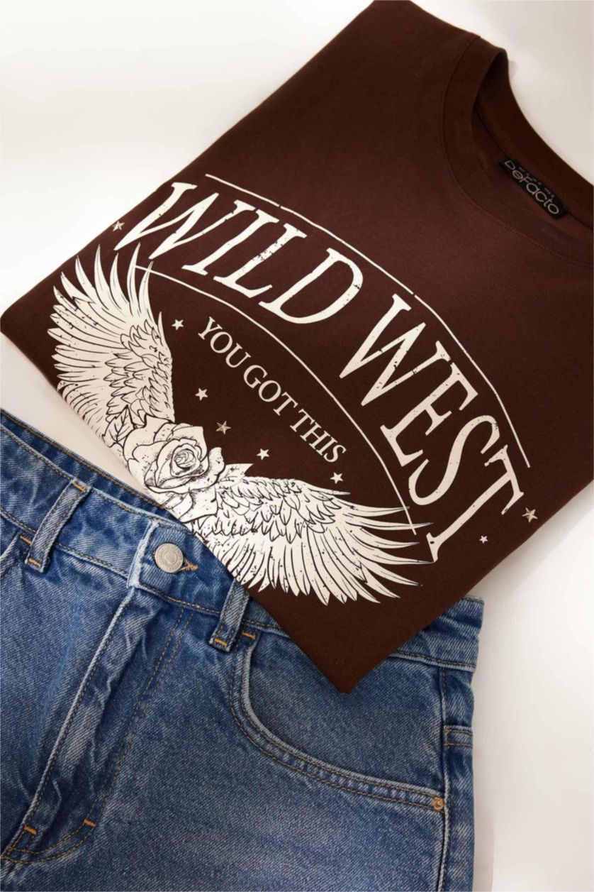 نساء بني تيشيرت واسع مطبوع بياقة مستديرة وأكمام قصيرة