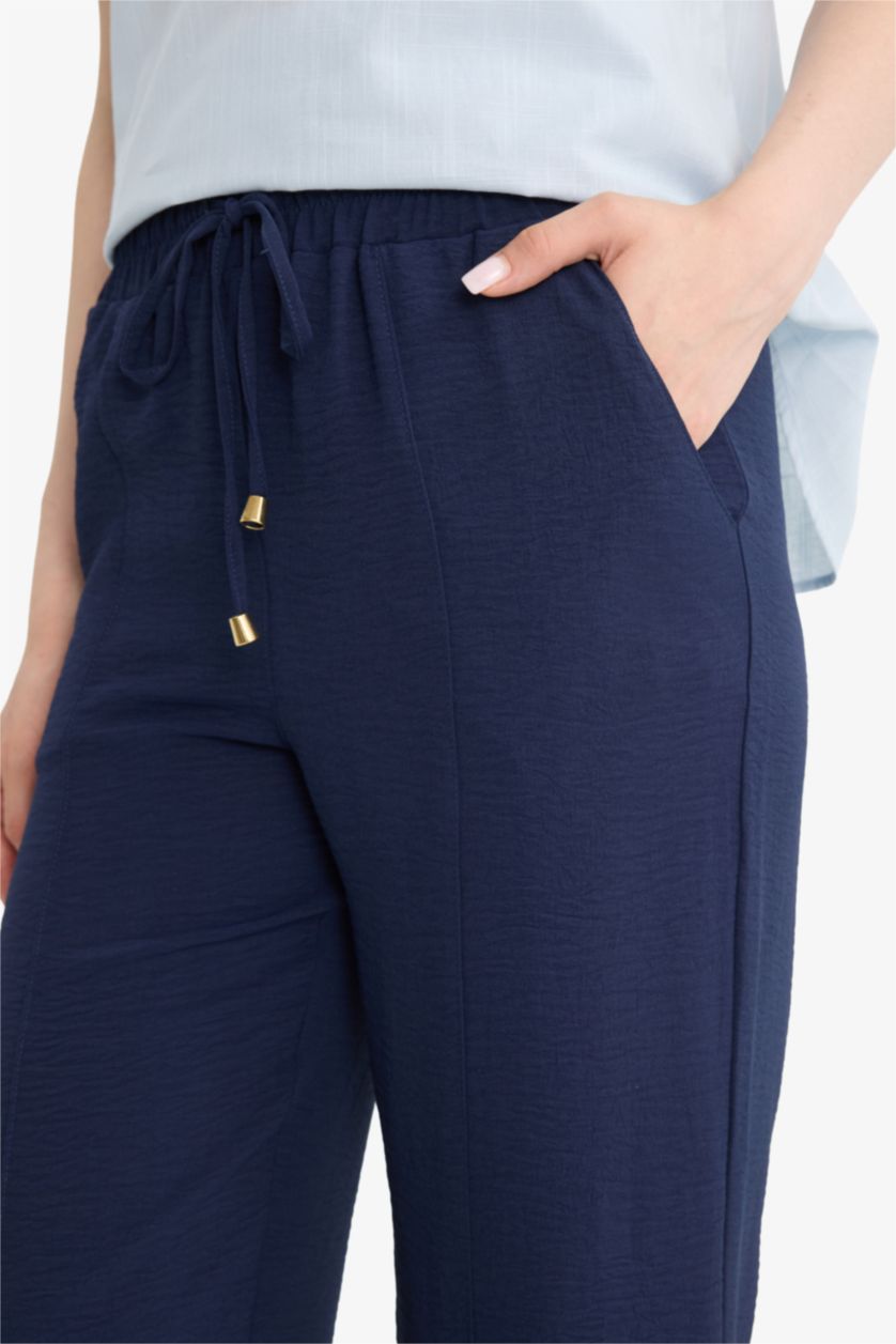 حريمي كحلي بنطلون ايروبين قصة عادية برجل عادية