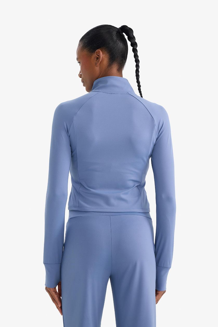 نساء نيلي فاتح سترة رياضية كم طويل سليم فيت برقبة عالية بجيب