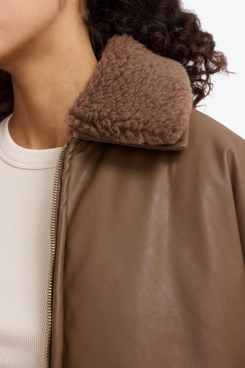 حريمي بني جاكيت جلد صناعي قصة عادية بياقة بولو