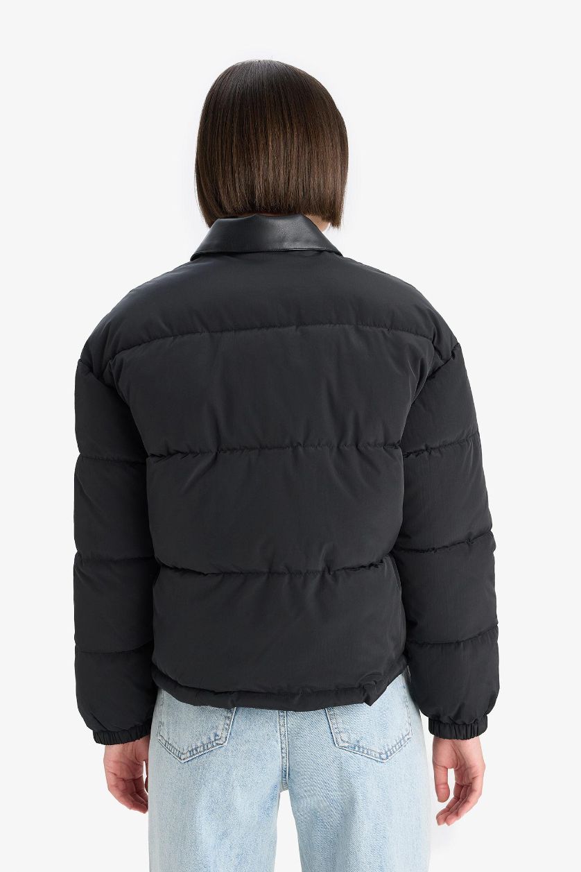 حريمي أسود جاكيت بامب قصة عادية بياقة بولو وتر بروف