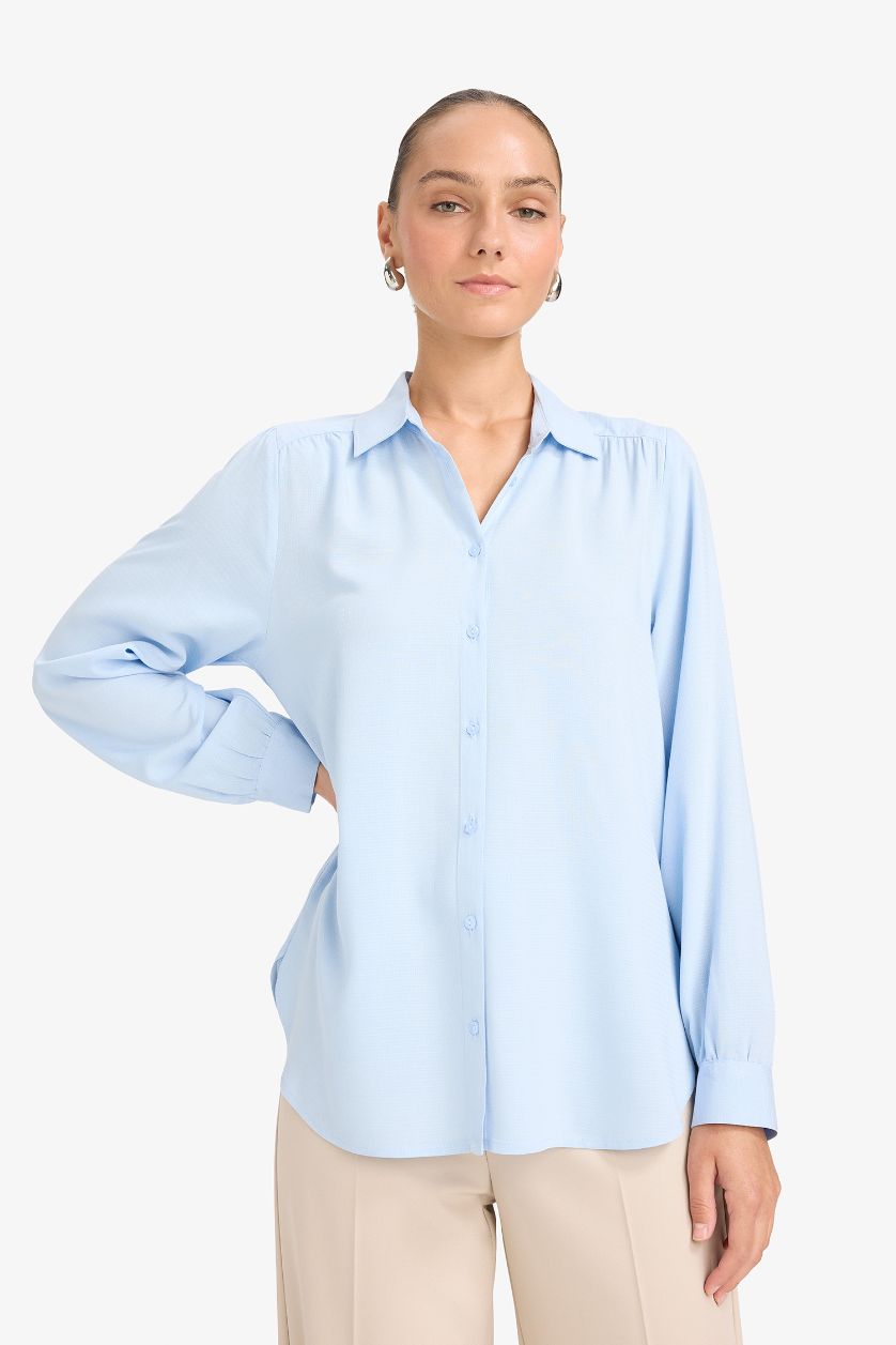 حريمي أزرق فاتح قميص كم طويل جاكار قصة عادية