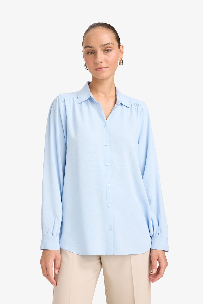 حريمي أزرق فاتح قميص كم طويل جاكار قصة عادية