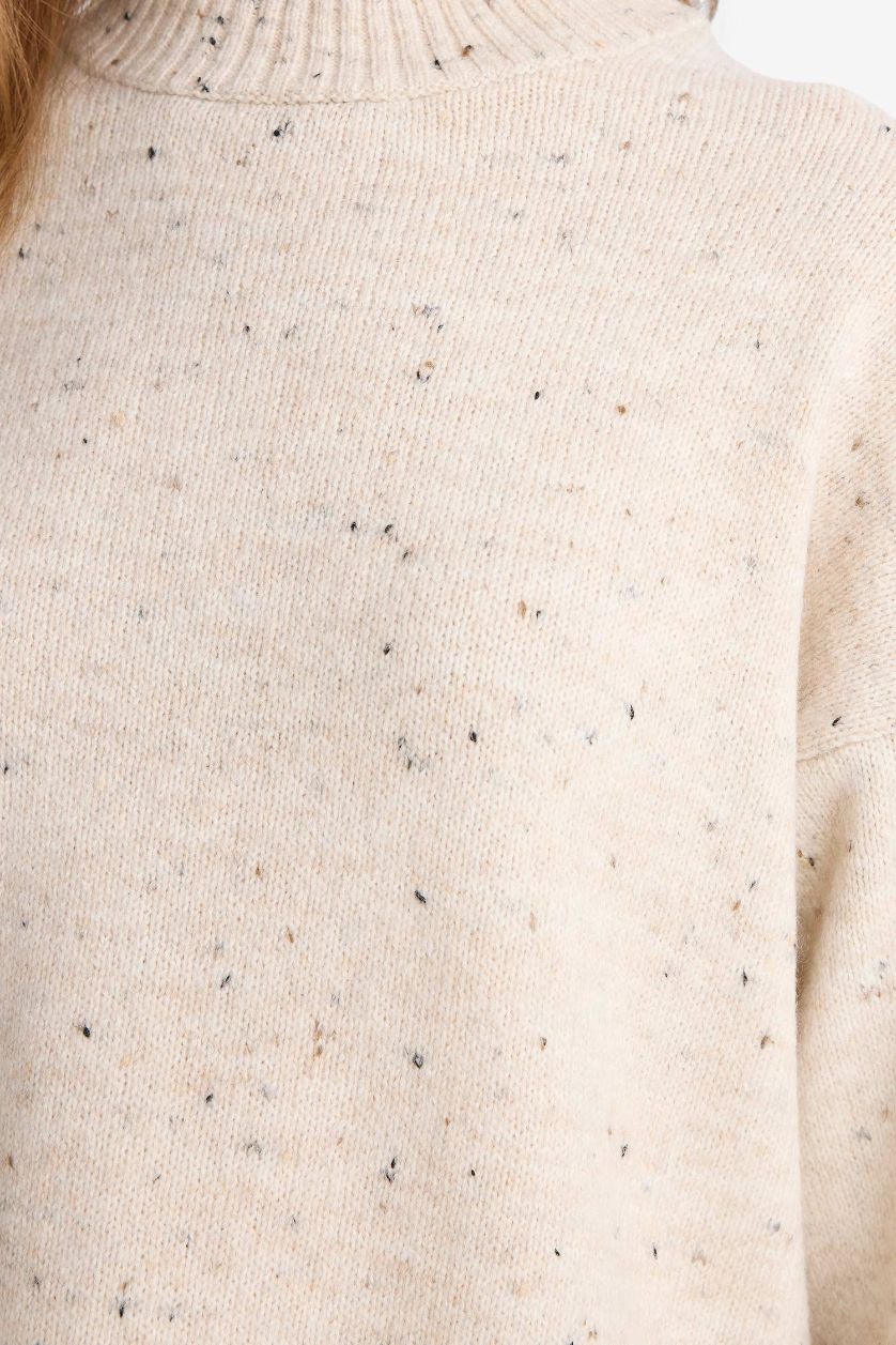 حريمي بيج فاتح تونيك تريكو قصة فضفاضة بياقة مستديرة