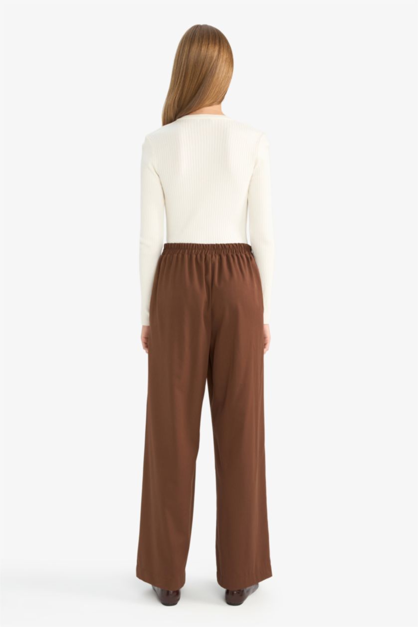 حريمي بني بنطلون وايد ليج برجل واسع