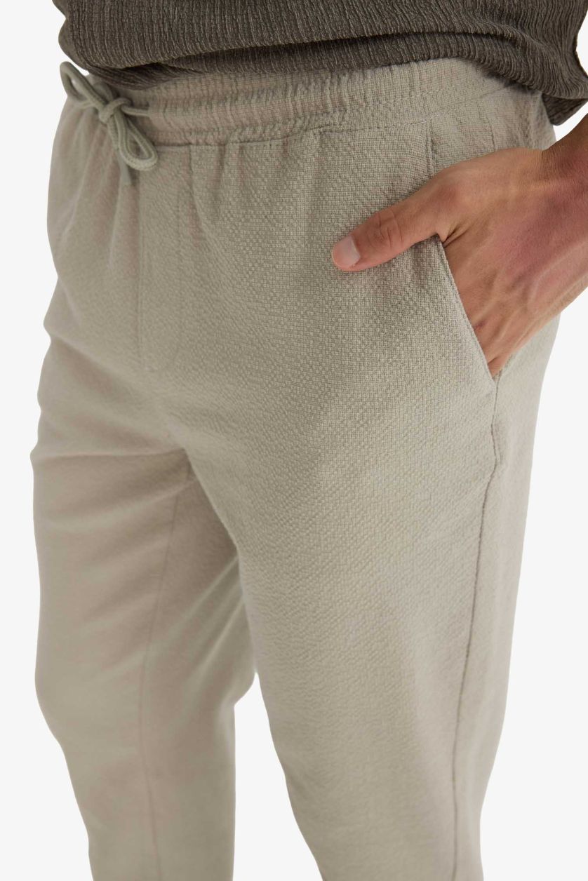 Erkek Açık Haki Jogger Fit Beli Bağcıklı Lastikli Cepli Pamuklu Dokulu Pantolon