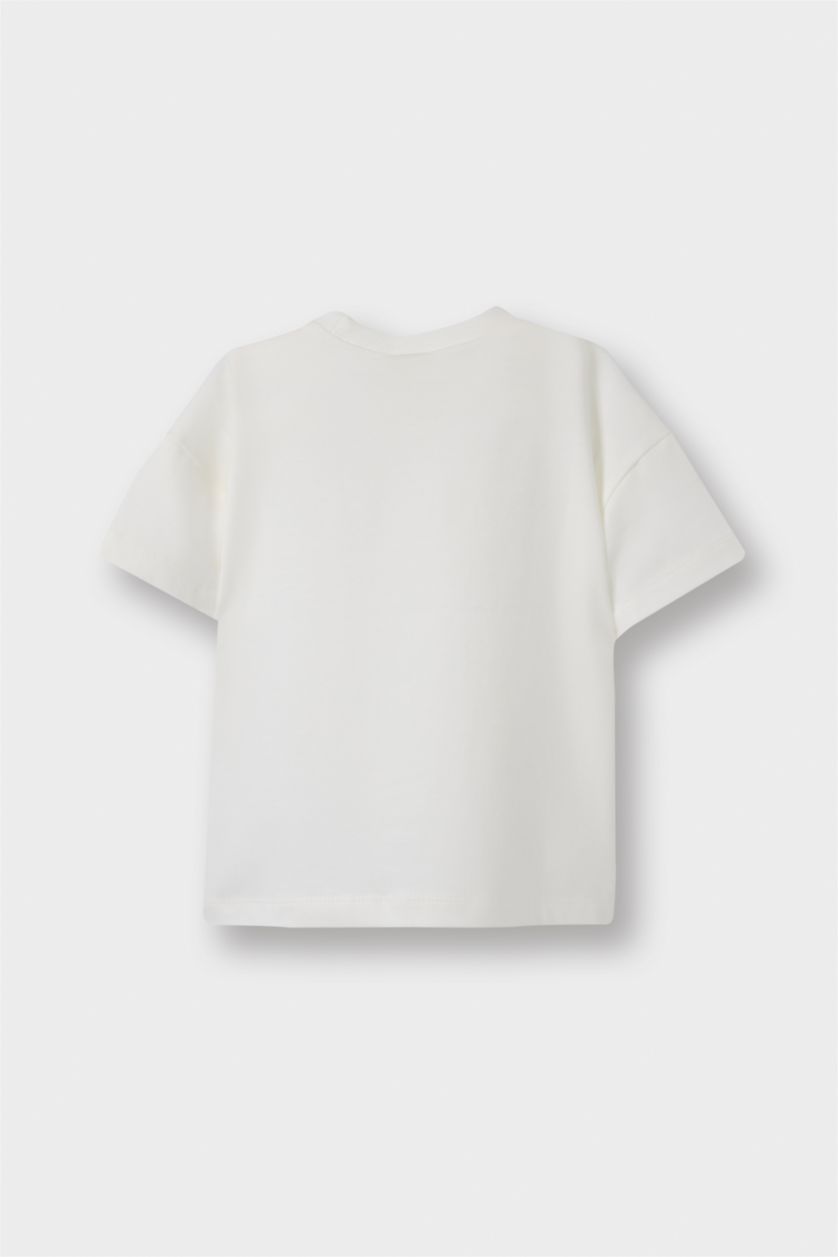 طفلة صغيرة بيج فاتح تيشيرت بيبي بناتي قصة عادية برقبة مستديرة بطبعة شعار