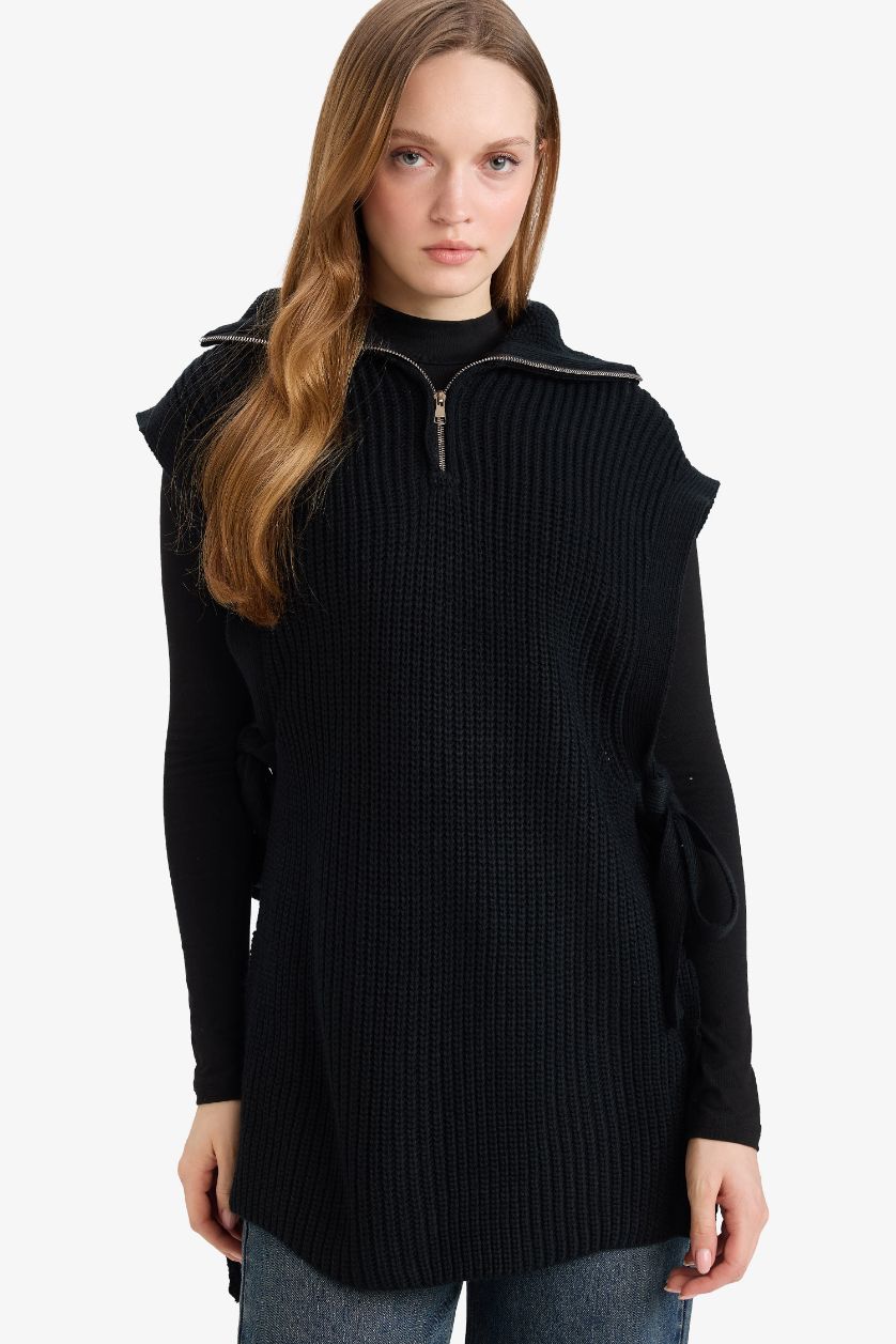 حريمي أسود فيست تريكو قصة عادية بياقة نص سوسته