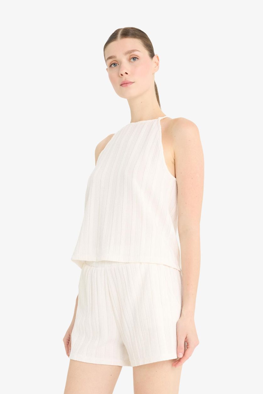 حريمي بيج فاتح شورت منسوج قصة عادية