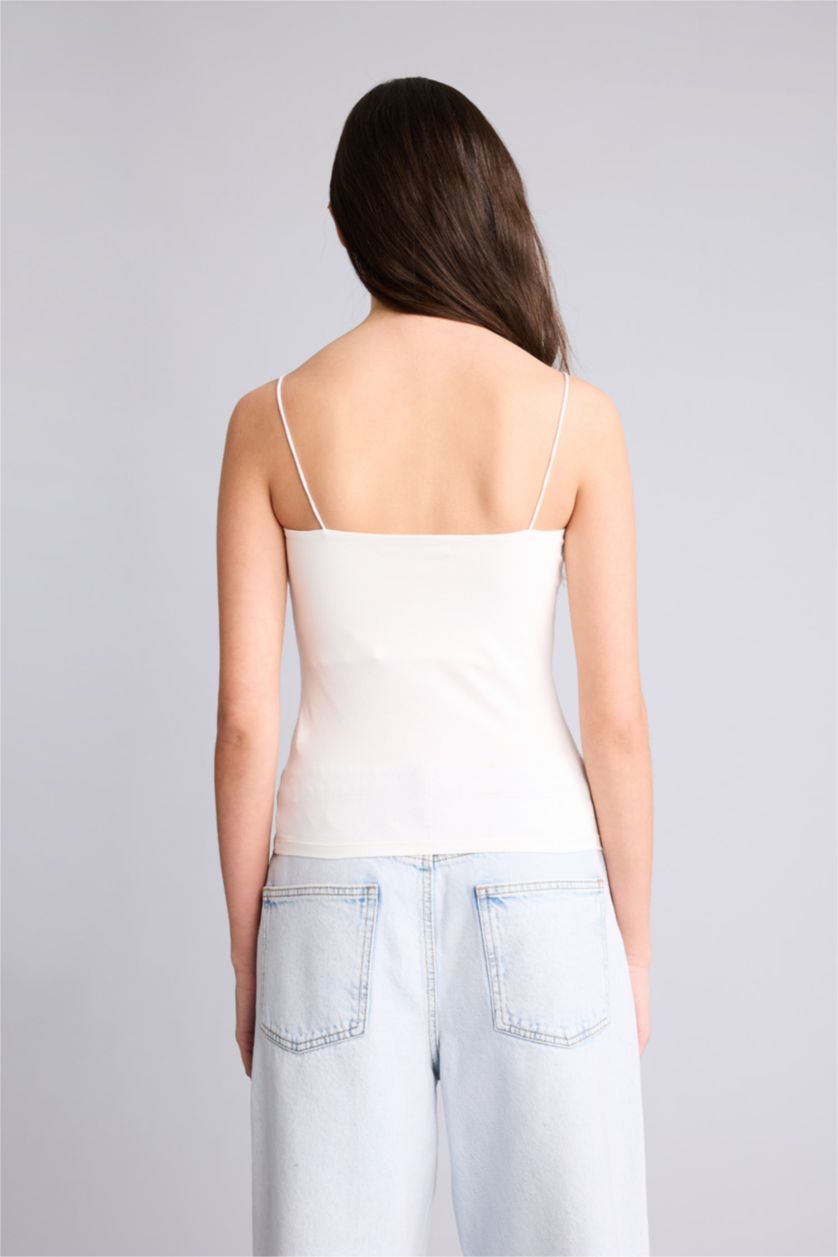 حريمي اوف وايت تانك توب سليم فيت بحمالات