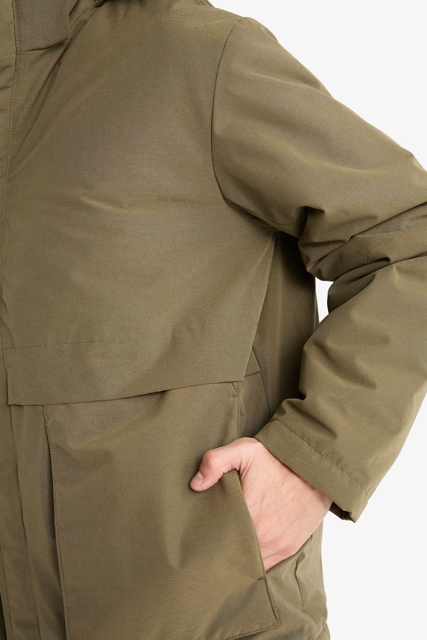 Ерлер хаки бас киімді Пальто