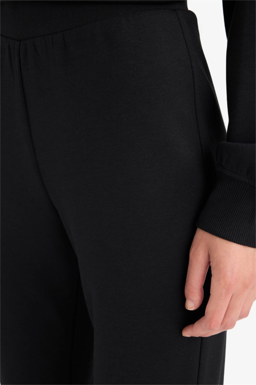 نساء أسود بنطرون فلير فيت برجل جارلس