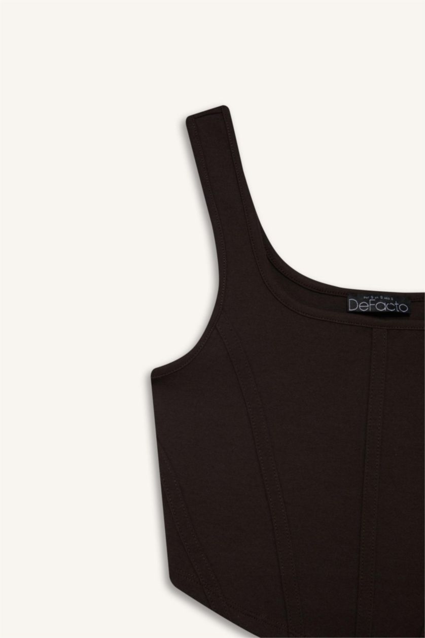 حريمي بني كروب توب بيزك سادة بياقة U