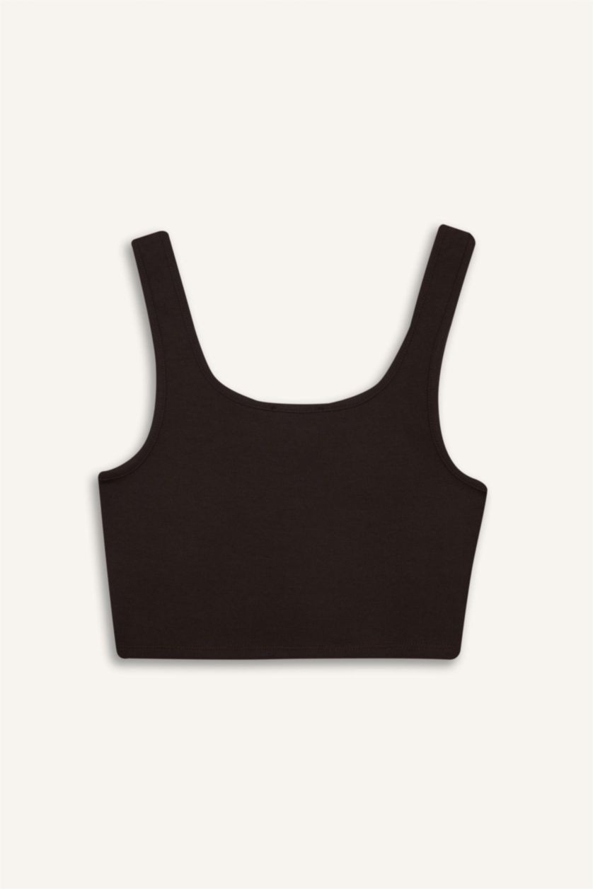 حريمي بني كروب توب بيزك سادة بياقة U