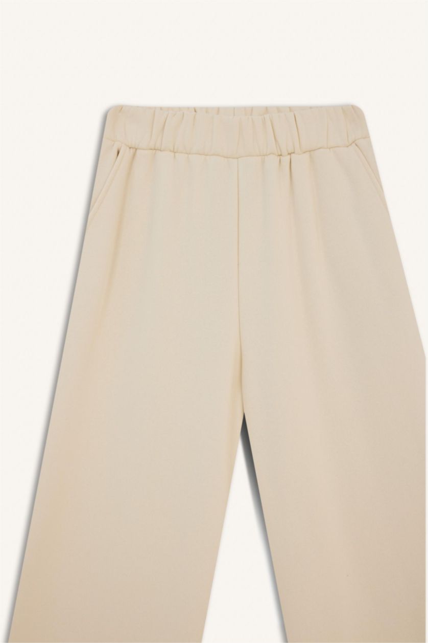 Woman Light Stone Straight Fit Pocketed Trousers