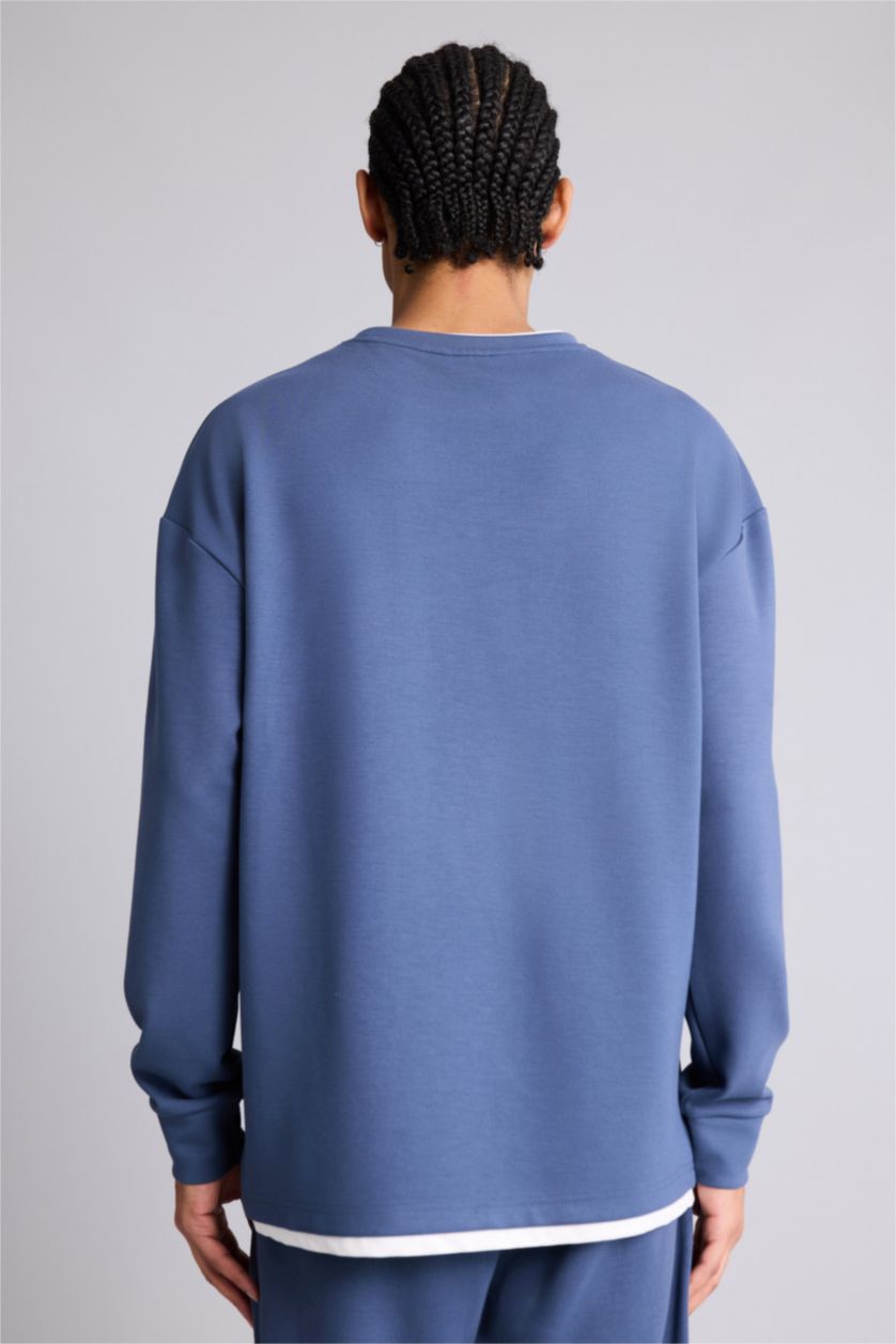 MAN Indigo Boxy Fit Boston Celtics Licensed Long Sleeve Sweatshirt