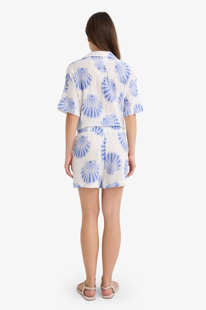 حريمي بيج فاتح شورت موسلين بخصر عالي منقوش