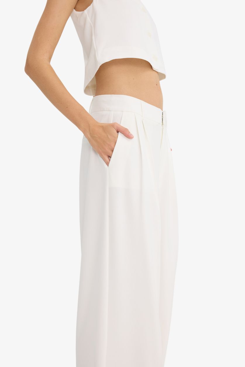 حريمي بيج فاتح بنطلون وايد ليج برجل واسع بجيب وخصر عالي