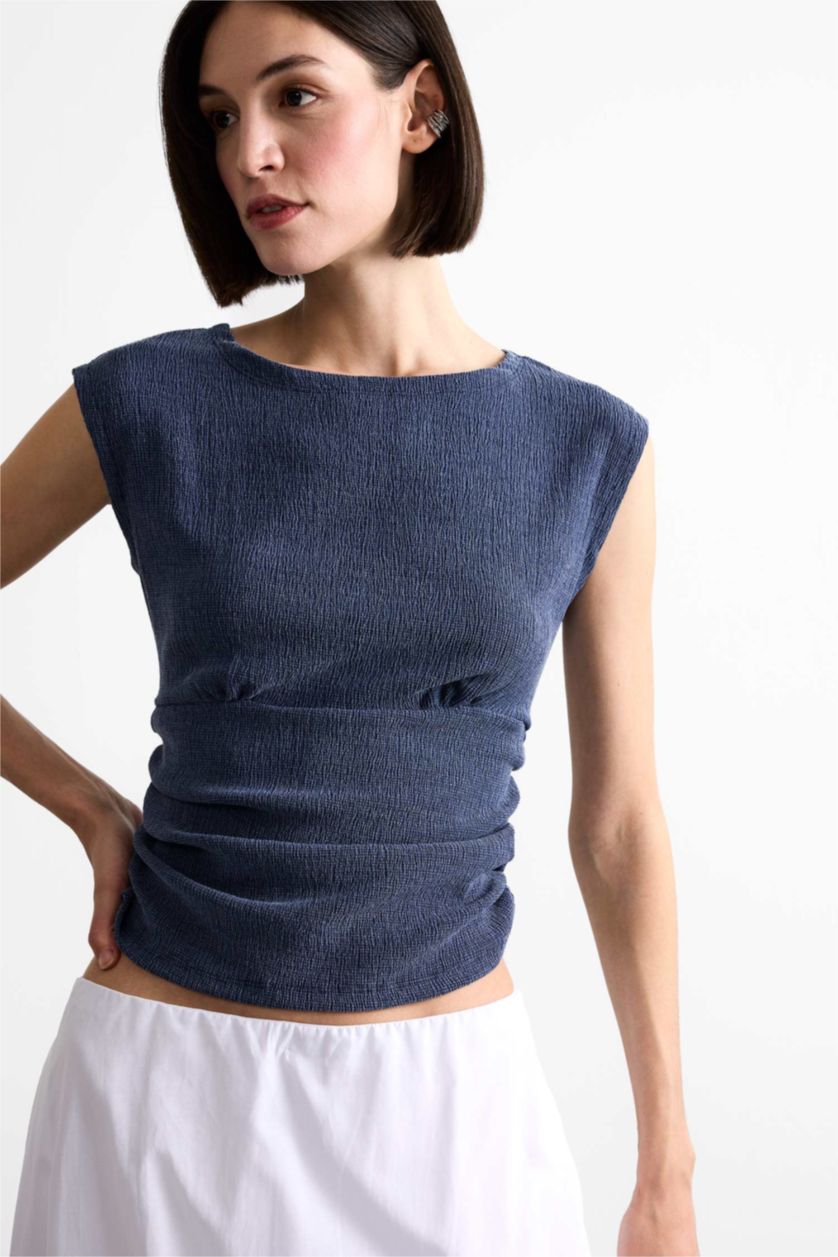 نساء كحلي بلوزة كت سادة بياخة مدورة