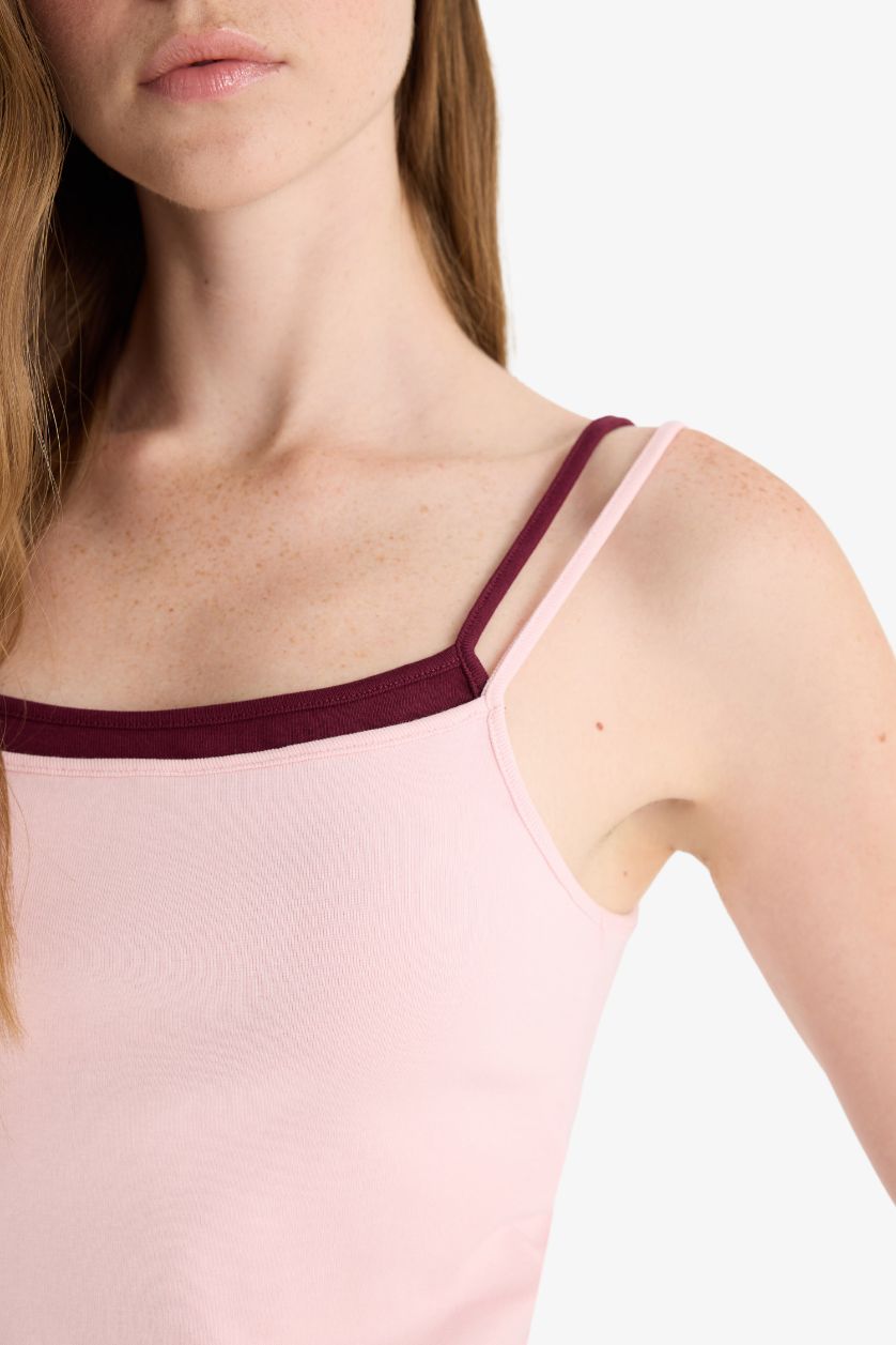 حريمي زهري تانك توب مضلع مخصر سليم فيت بياقة U