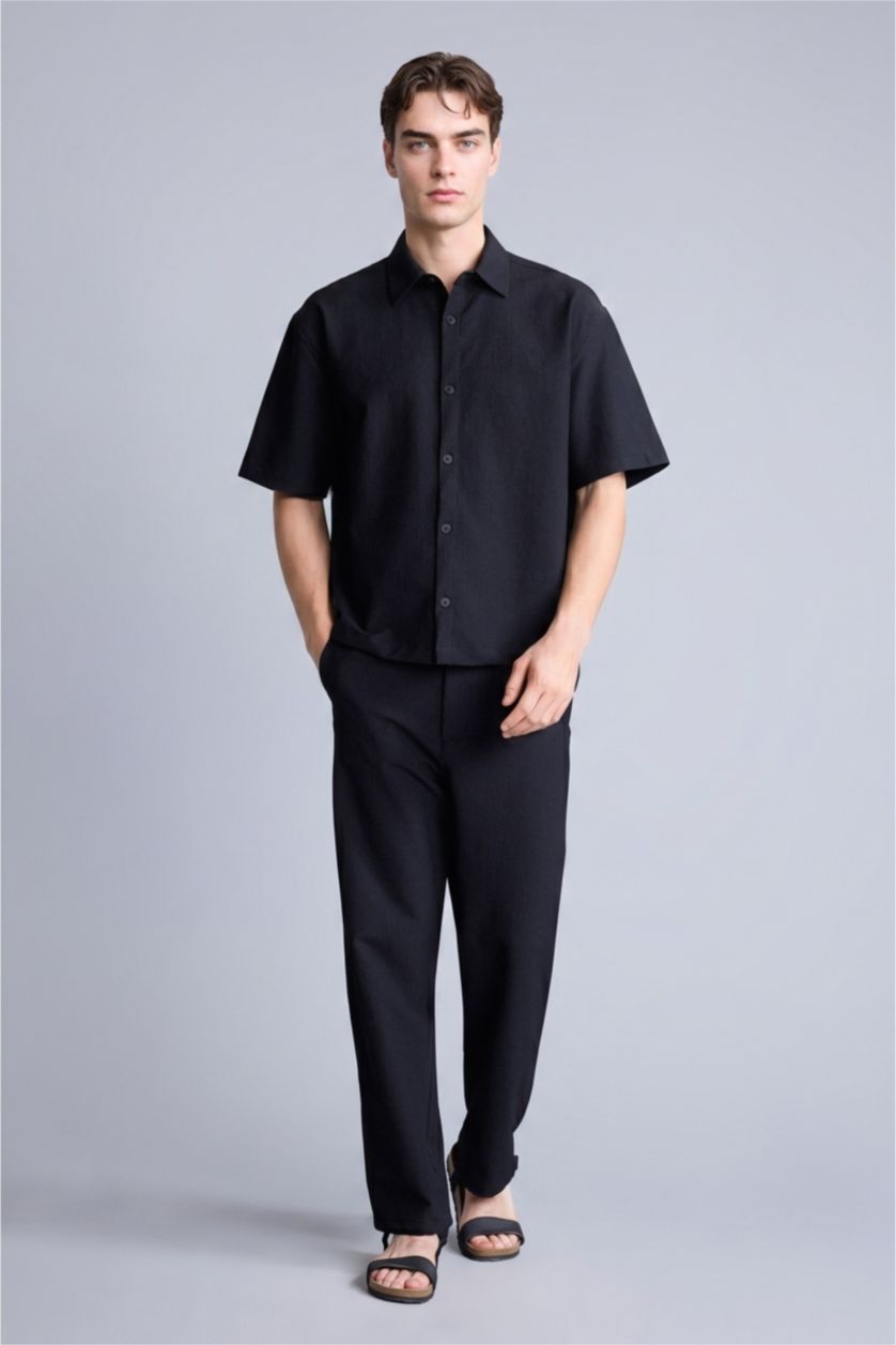 MAN Black Baggy Fit Trousers